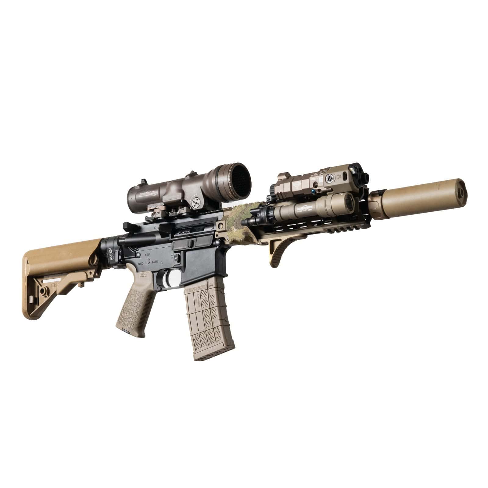 Andro Corp 10.3 inch 5.56 NATO rifle in black with tan furniture, equipped with a Law Tactical folding adapter, SOPMOD stock, Geissele rail, SilencerCo suppressor, Meyers MAWL-C1+ modular advanced weapon laser, and SureFire weapon light for advanced tactical performance
